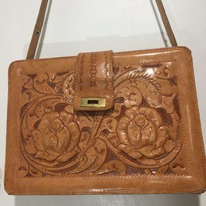 VINTAGE HAND TOOLED LEATHER SADDLE HANDBAGS